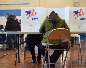 Syracuse University students ride bus to polls near campus to vote for 1st time