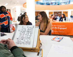 Caricaturists poke fun at SU students with free cartoon profiles