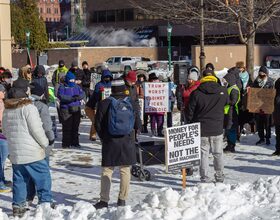 Syracuse residents protest Trump in MLK Day march