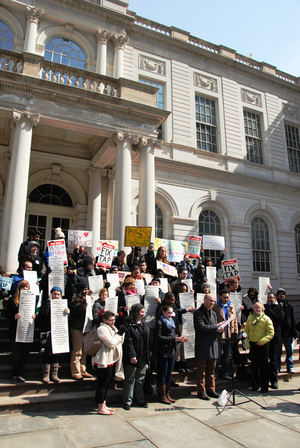 Members of the New York Public Interest Research Group rally for Tuition Assistance Program reform outside New York City Hall last Tuesday. The organization is calling for aid expansion to make college more affordable. 