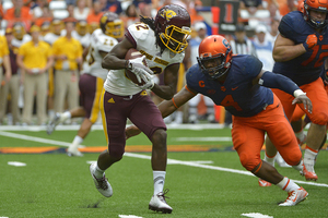 Linebacker Zaire Franklin leans in to hit a Central Michigan player with the ball. Franklin registered six solo tackles on Saturday.