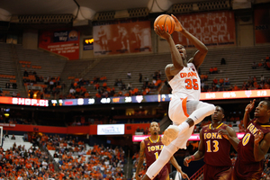 Bourama Sidibe helped control the frontcourt for the Orange in the win over Iona.