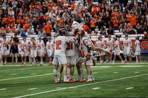 Syracuse, pictured earlier this season, celebrating. 