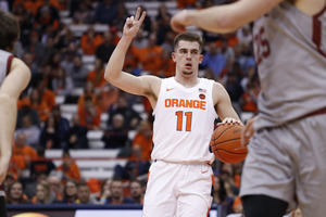 Joe Girard III scored five points in the Orange's 70-54 win against Colgate.