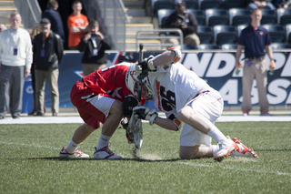 Brendan Conroy fights for a faceoff.