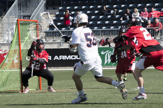 Luke Cometti looks to shoot in Syracuse's win over St. John's.