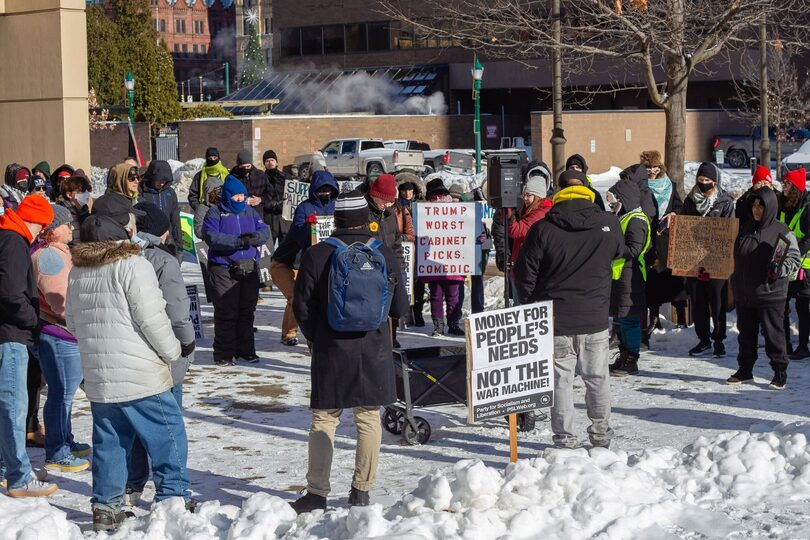 Syracuse residents protest Trump in MLK Day march