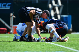 Ben Williams crouches down for a faceoff. The sophomore won 21-of-35 at the X on the day.